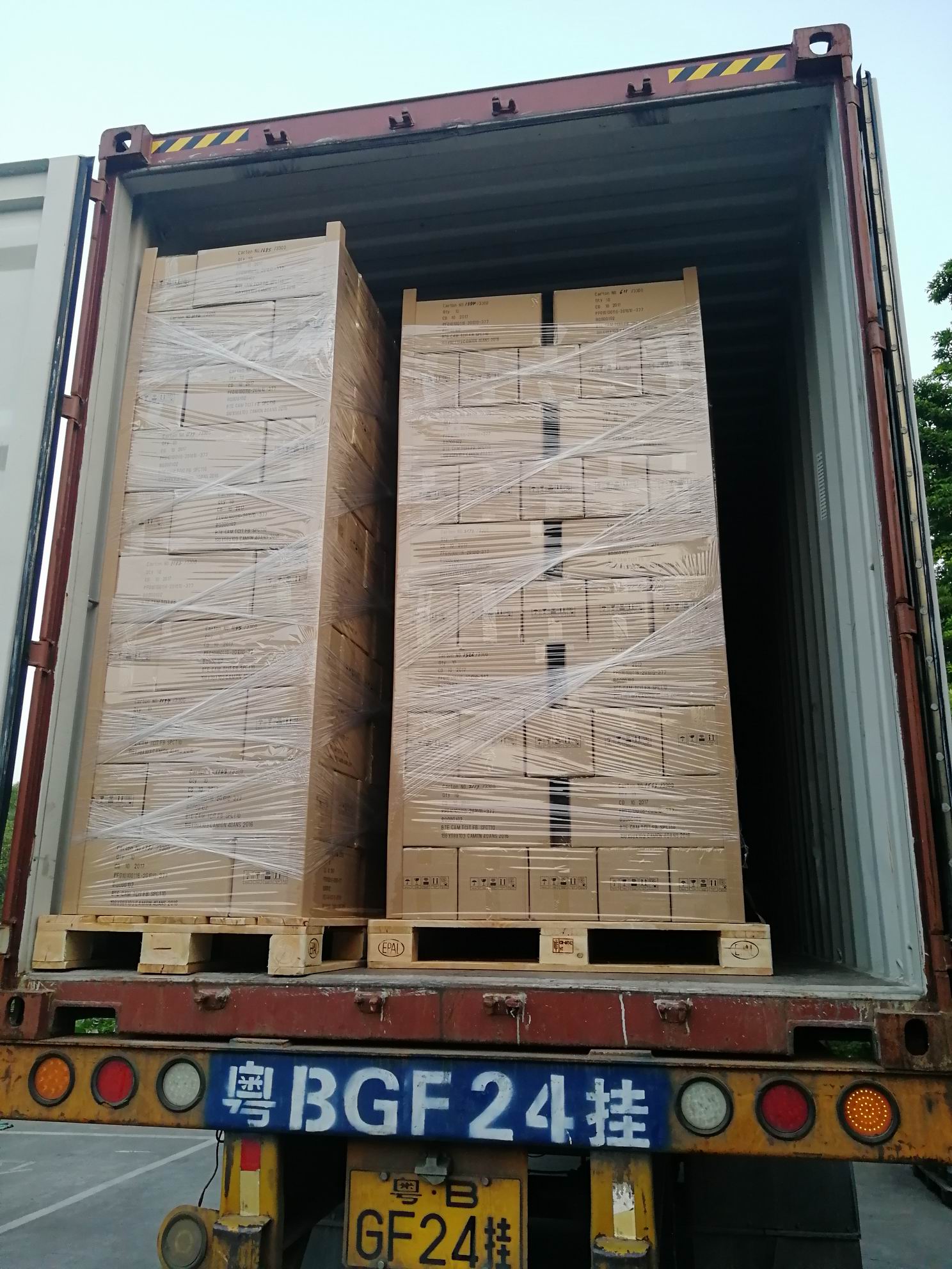palletized export cartons loaded into container